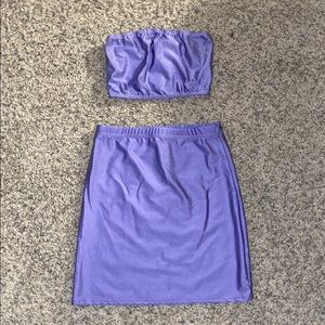 A purple two piece mini skirt and bandeau set NWOT